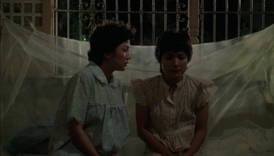 Vilma Santos confronts Gina Alajar in a scene in an interior night scene in Sister Stella L